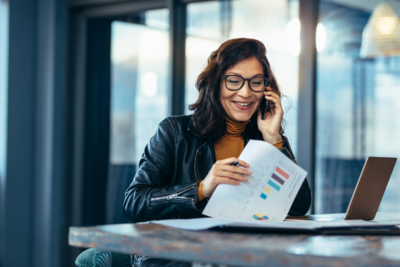 Person smiling on the phone