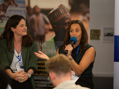 People talking on a Women in Logistics Panel at a Supply Chain Tech Event